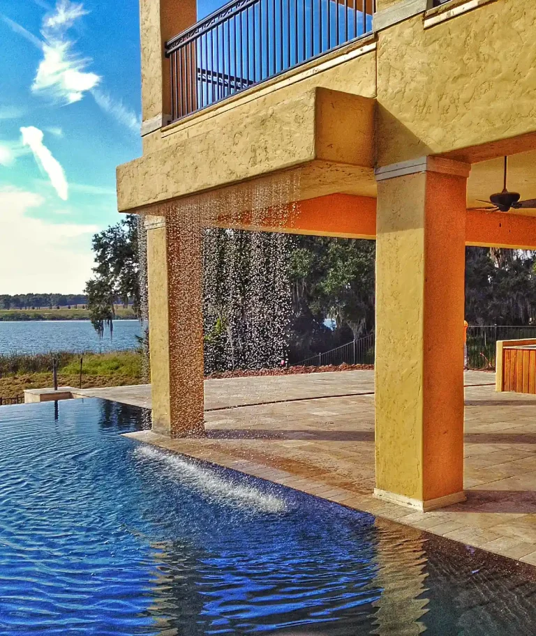 Perimeter overflow pool with rain curtain