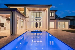 pool and spa with outdoor kitchen